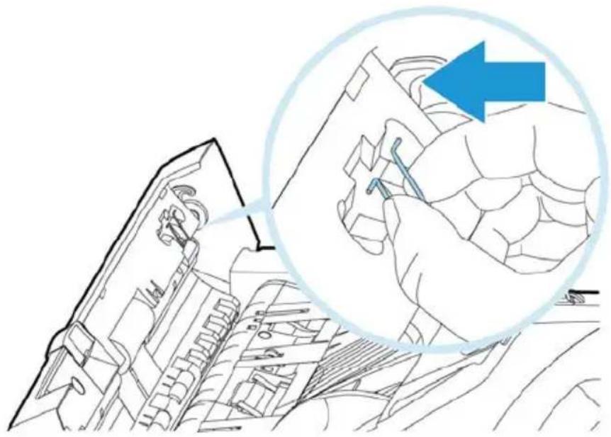 Technical line drawing of a mechanical assembly with a magnified inset showing a hand holding a tool, no text or symbols present.