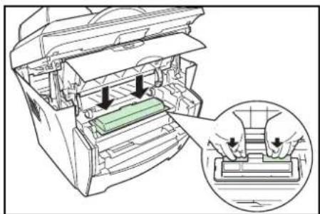 Diagram showing a printer's internal structure with arrows indicating assembly or process, and an inset magnified view of hands using a device.