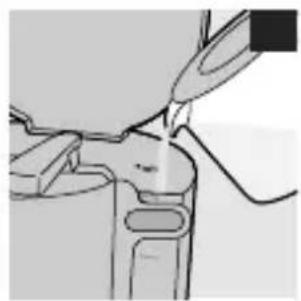 Line drawing of a mechanical component with a tool interacting with it (no text or symbols)