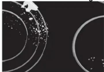 Abstract circular patterns with scattered white dots on a dark background, no text or symbols present.