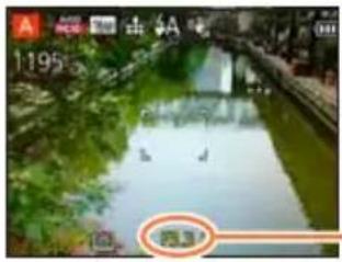 Scenic canal view with green vegetation and water reflections, no visible text or symbols