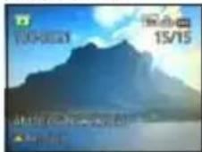 Mountain landscape with blue sky and water, no visible text or symbols