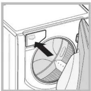 Diagram of a washing machine interior showing the fan blade and door handle (no text or symbols)