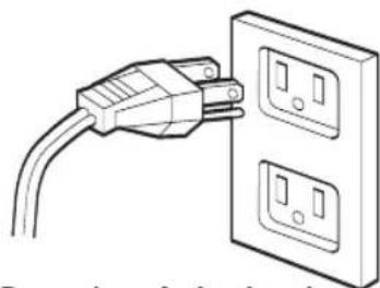 Line drawing of a plug inserted into a wall socket (no text or symbols)