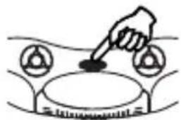 Simple line drawing of a hand pointing at a small object on a heating element (no text or symbols)