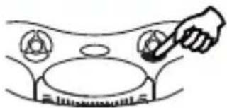 Simple line drawing of a hand using a tool to clean or store items around a gas stove (no text or symbols)