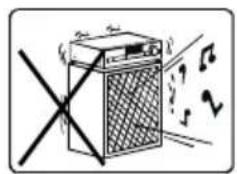 Diagram showing a washing machine with noise and a crossed-out box, indicating sound or vibration.