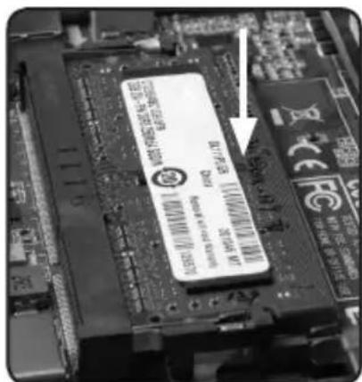 Close-up of a computer motherboard with a visible price tag and electronic component labels