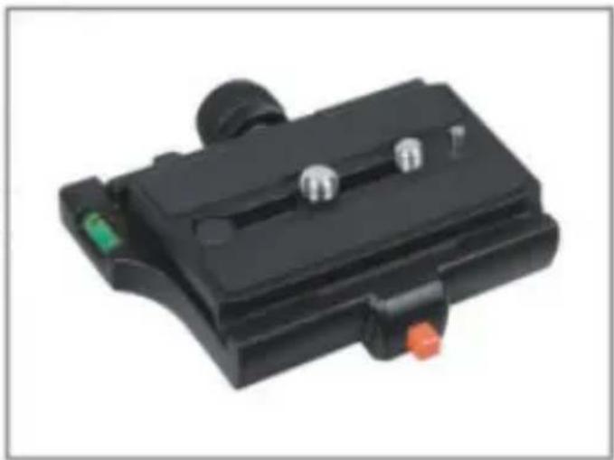 Black mechanical component with adjustment knobs and a green indicator button (no visible text or symbols)
