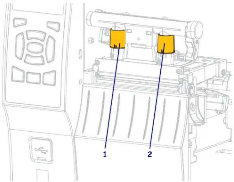 Technical diagram of a device with labeled components, showing two yellow cylindrical parts inserted into a rack.