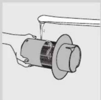Illustration of a hand operating a cylindrical mechanical component with a flanged end (no text or symbols visible).