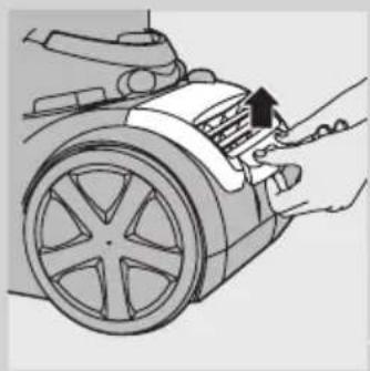 Illustration of hands installing or adjusting a mechanical component with a black arrow pointing to the component (no text or symbols present).