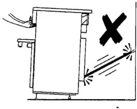 Simple line drawing of a device with a hand operating it and a cross symbol indicating explosion or damage (no text or labels)