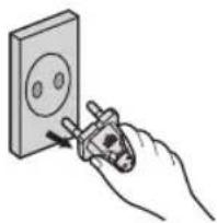 Hand using a tool to adjust or install a wall socket (no text or symbols visible)