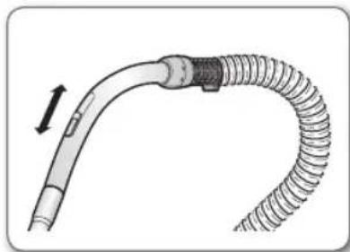 Diagram of a flexible medical tube with a black connector and directional arrow (no text or labels)