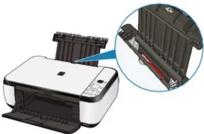 Illustration of a printer with a magnified inset showing internal components (no text or symbols)