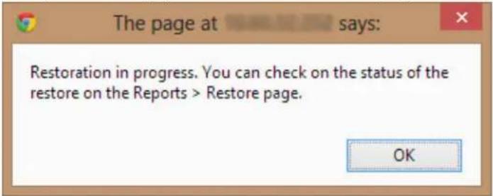 The page at says: Restoration in progress. You can check on the status of the restore on the Reports > Restore page. OK