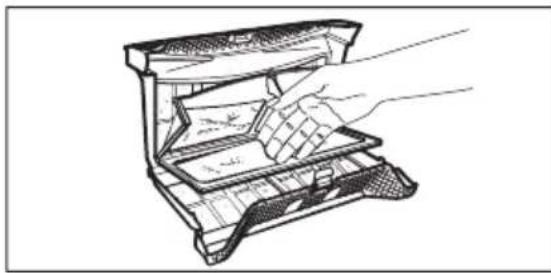 Line drawing of a hand inserting a component into a device (no text or symbols)