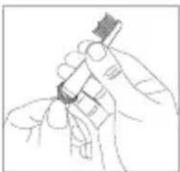 Line drawing of hands holding a tool or device (no text or symbols visible)