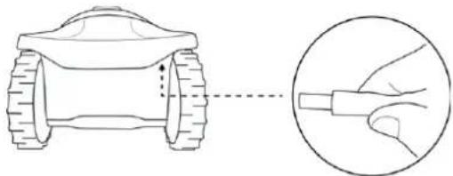 Diagram showing a robotic vehicle with a close-up view of its cable being inserted (no text or symbols present)