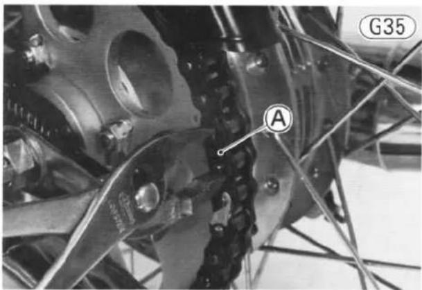 Close-up of an aircraft engine bay with visible gears and structural components (no text or symbols)