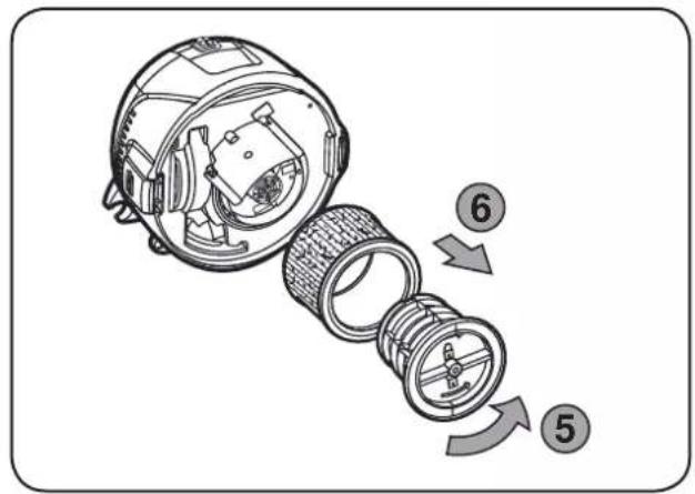 Diagram of a device with labeled parts showing internal components and directional arrows indicating motion or assembly.