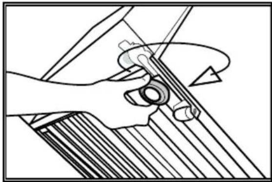 Mechanical diagram showing a hand operating a tool with a circular arrow indicating rotation (no text or symbols present).