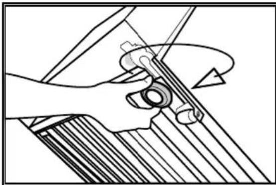 Mechanical diagram showing a hand operating a tool with a curved handle (no text or symbols present).