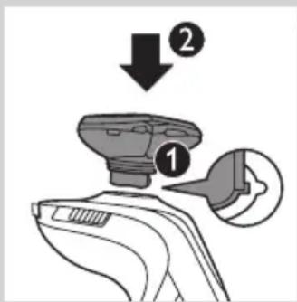 Diagram showing a device with labeled parts and directional arrows, likely illustrating a process or assembly step.