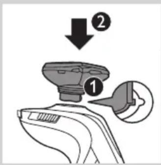 Diagram showing a device with labeled parts and directional arrows, likely illustrating a process or assembly step.