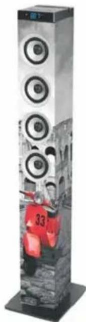 Exterior view of a tall, multi-tiered speaker tower with visible sound waves and a person wearing a red vest (no text or symbols)