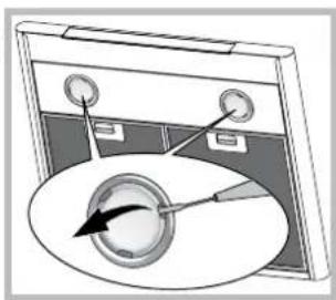Diagram of a device with a magnified view showing a circular component and control knobs (no text or symbols)