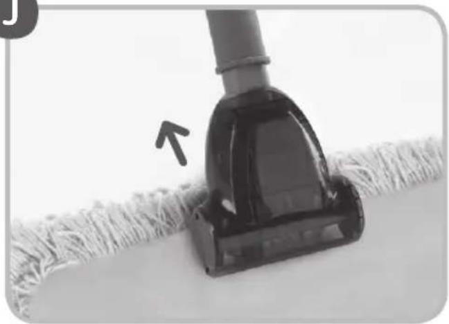 Close-up of a black vacuum cleaner on a textured surface, with an arrow pointing to the component (no text or symbols visible)