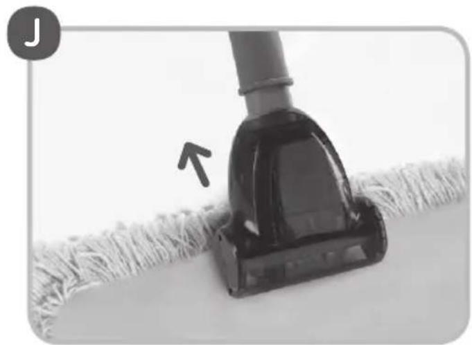 Close-up of a vacuum cleaner cleaning a textured surface, with an arrow pointing to the clean area (no text or symbols visible)
