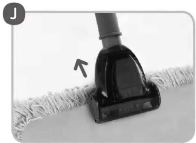 Close-up of a vacuum cleaner cleaning a textured surface with an arrow indicating the process (no text or symbols visible)