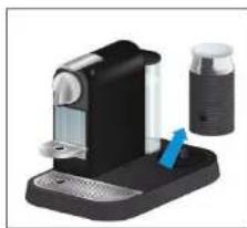 Illustration of a coffee machine with a blue arrow indicating a handle, no text or symbols present.