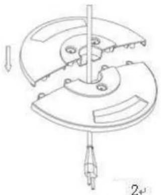 Mechanical assembly diagram showing a rotating component with a shaft and base, no text or symbols present