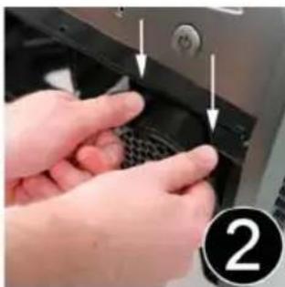 Close-up of hands holding a device component with arrows pointing to the ports (no visible text or symbols)