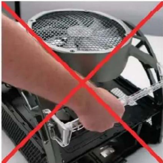 Close-up of a hand holding a plastic tool inside a computer motherboard, with red cross lines indicating no text or symbols.