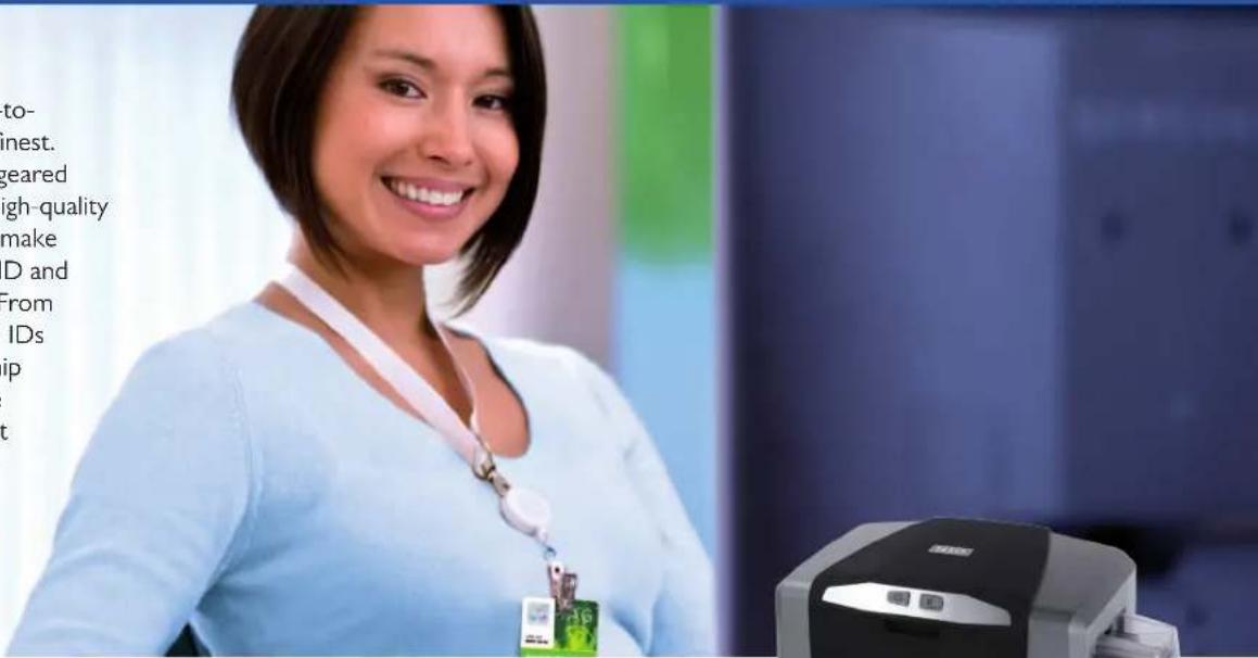 Woman smiling in a lab setting with visible product packaging and background text fragments