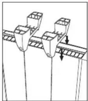 Diagram of two container-like structures with downward arrows indicating movement or force (no text or symbols)