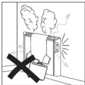 Safety warning illustration showing a device emitting exhaust smoke with a 'No Entry' symbol crossed out.
