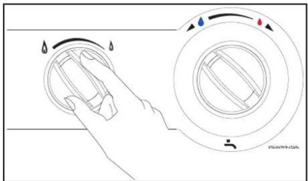 Diagram showing hand pressing down on a circular component with water drop indicators and directional arrows, likely illustrating fluid or mechanical control.