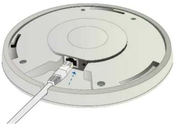 3D diagram of a device's internal structure showing a connector inserted into a circular housing (no text or symbols visible)