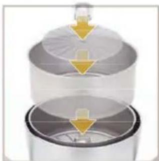 Two stacked containers with yellow arrows indicating downward flow or process (no text or symbols)