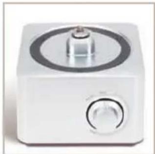 White square electronic device with a circular top and control knob (no visible text or symbols)