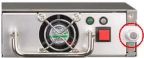 Close-up of a metallic industrial control panel with fan, buttons, and a red circular button (no visible text or symbols)