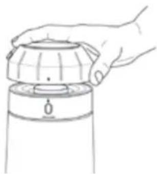 Line drawing of a hand holding a cylindrical device with a knob (no text or symbols)