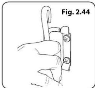 Illustration of a hand holding a tool with three circular components, labeled Fig. 2.44 (no text or symbols on the diagram itself)
