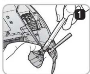 Close-up of hands using a tool to adjust or install electronic components (no visible text or symbols)